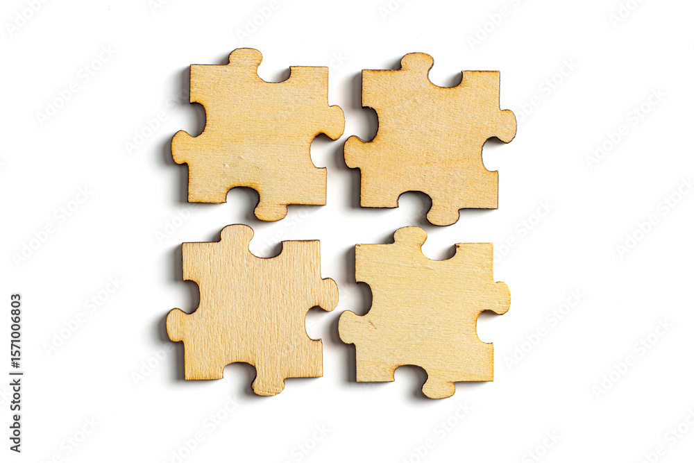 Fototapeta premium wooden jigsaw puzzle pieces isolated on white background.