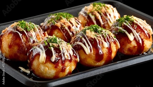 Delicious Takoyaki in a Black Plastic Container, Close-up of several savory takoyaki balls, a popular Japanese street food, arranged in a black plastic takeout container.
