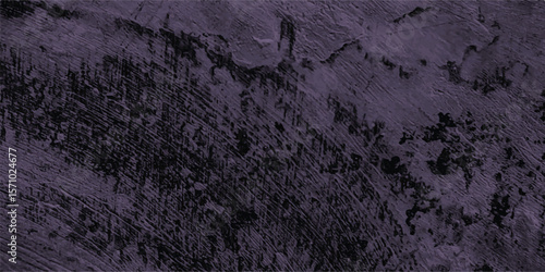 Textured abstract background in dark purple depicting weathered and rough surface ideal for graphic design and creative projects with moody aesthetic