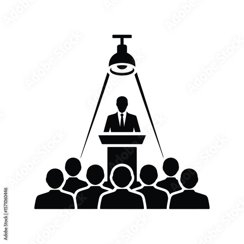 Speaker addressing audience under spotlight podium presentation