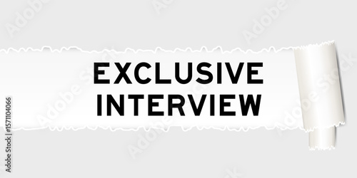 Ripped gray paper background that have word exclusive interview under torn part