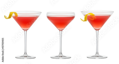 Three pink cocktails with lemon twist isolated on transparent background