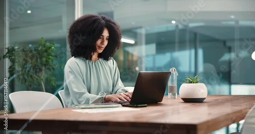 Business woman, laptop and typing in corporate office for email, thinking and online as correspondent. African person, technology and director of content strategy and communication writing a response