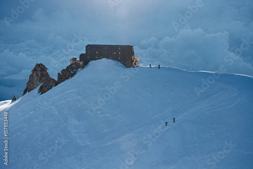 flying view of the Capanna Regina Margherita on the Punta Gnifetti mountain peak in the Alps of Switzerland above Zermatt