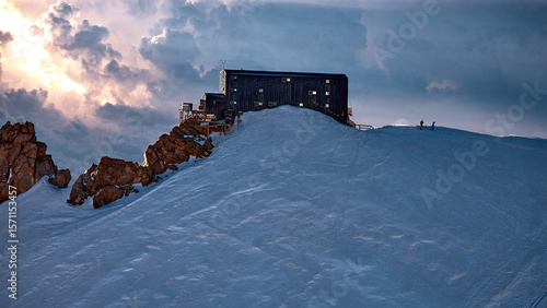 flying view of the Capanna Regina Margherita on the Punta Gnifetti mountain peak in the Alps of Switzerland above Zermatt