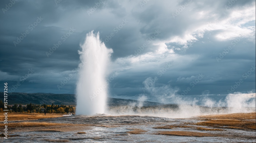 Majestic geyser erupts powerfully into cloudy sky, creating stun Majestic geyser erupts powerfully into cloudy sky, creating stun