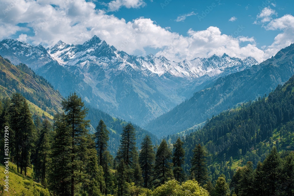 Breathtaking mountain vista with snowy summits and verdant valleys beneath a clear sky with clouds Breathtaking mountain vista with snowy summits and verdant valleys beneath a clear sky with clouds
