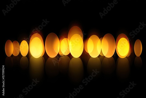 Golden eggs on dark background, bokeh effect