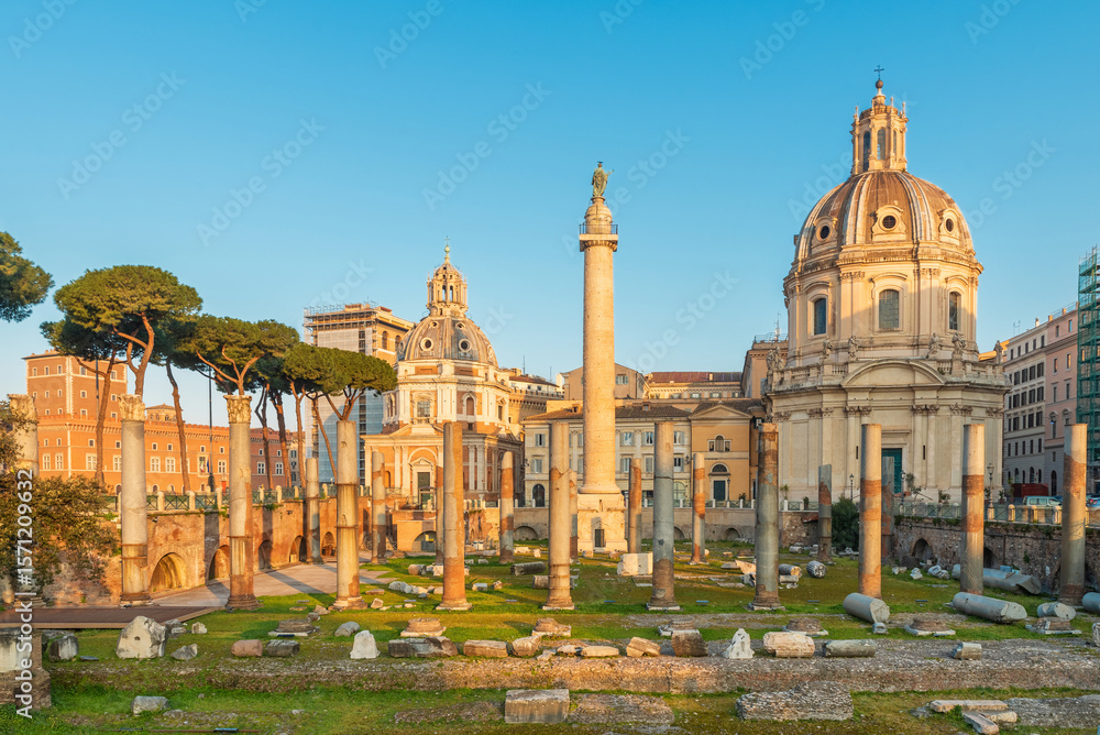 Obraz premium Ancient Roman ruins and Trajan's Column at Trajan Forum in Rome Italy with Baroque churches and Italian architecture. Rome cityscape at sunrise. Travel and touristic landmark in Europe
