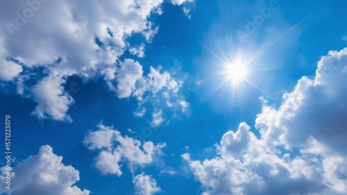 Blue sky with white clouds and sun shining wide-angle lens bright sunshine sunny day blue sky background white clouds bright sunshine sunny weather sky clear weather blue sky