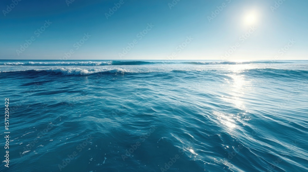 Fototapeta premium Calm ocean waves under a bright sun