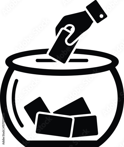 A hand is placing money into a donation box, representing charity, fundraising, and community support