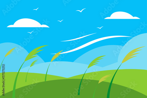 Serene windy grasslands under a blue sky nature landscape
