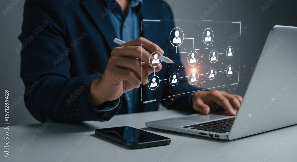 Photo of a businessman visualizes a network connection and team collaboration structure on a laptop Photo of a businessman visualizes a network connection and team collaboration structure on a laptop
