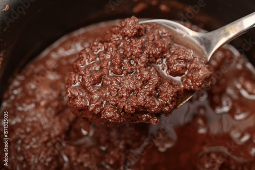 Ugly, unappetizing, spoiled by chocolate icing, stratified into prime factors, curdled chocolate,