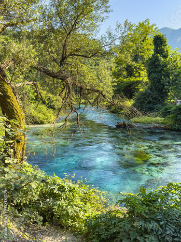 The Blue Eye is a water spring in Albania. The water is so clear that you can see al the way through to the bottom and observe the light blue bubbles rising to the surface.