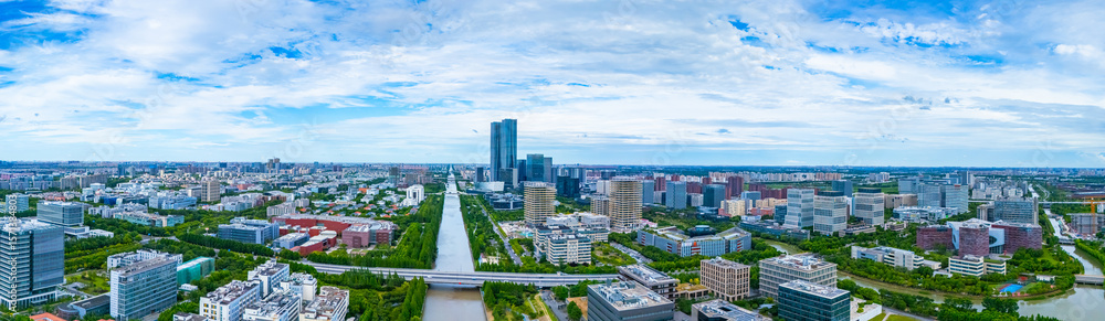 Fototapeta premium Panoramic aerial view of Shanghai Zhangjiang Hi Tech Development Zone on sunny day.