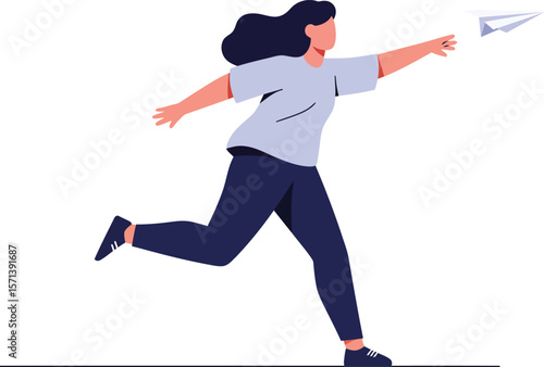 Woman running happily throwing paper airplane outdoors playful activity joy and freedom expression