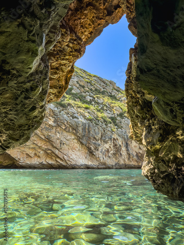 The Blue Cave in Albania is a mesmerizing natural wonder known for its vibrant azure waters and stunning rock formations.