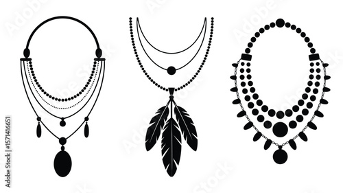 Three necklace designs in black and white with various pendants and beaded strands displayed together