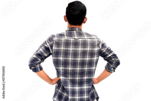 Back view of a young man in a plaid shirt against a plain white background, thoughtful posture