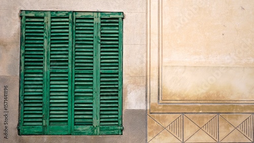 rustic window with shutters slats wood on wall