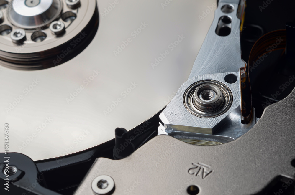 Computer components: hard drive detail close-up, metal parts, detailing Computer components: hard drive detail close-up, metal parts, detailing