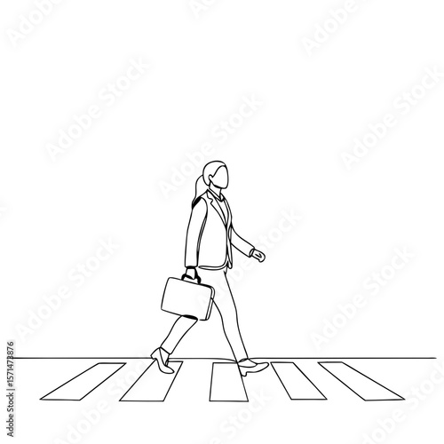 Businesswoman walking across crosswalk holding briefcase  