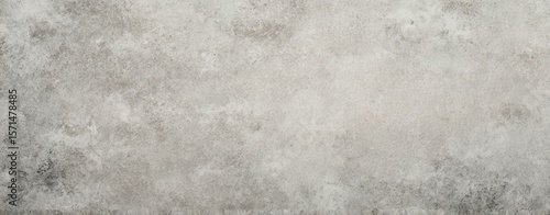 Panel kuchenny z motywem The textured grey concrete surface providing a modern backdrop for design projects.