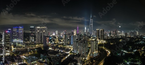 Photography Nighttime view of a sprawling city skyline.
