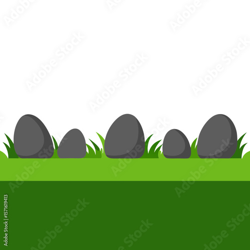 Smooth grey stones lined up on green grass with white background