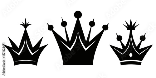three black crown silhouettes in different sizes for royal luxury branding isolated on white background.