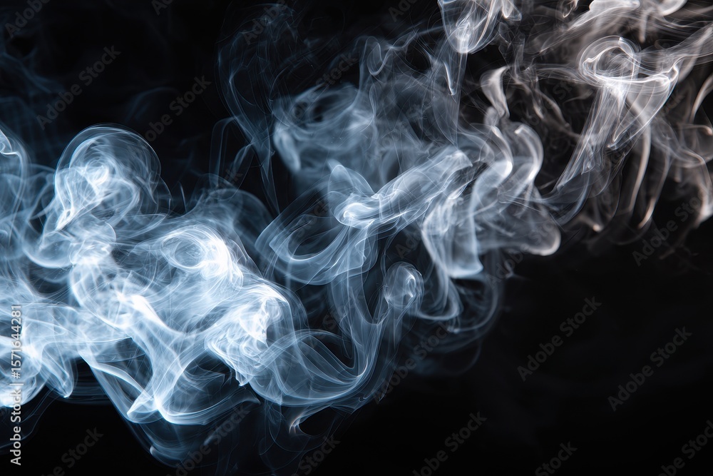 Fototapeta premium Grey smoke swirls and dances against a black backdrop, creating an ethereal ambiance filled with mystery and intrigue, captivating the viewer with its delicate forms