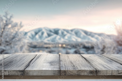 Wallpaper Mural Wooden terrace overlooking a blurred snowy landscape with distant mountains and Christmas decorations in the soft winter light Torontodigital.ca