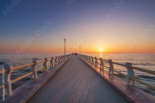 Fototapeta Naklejka Na Ścianę i Meble -  The pier of Forte dei Marmi at sunset. Versilia, Tuscany, Italy