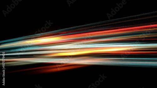 Colorful speed light trails on black background, motion blur effect