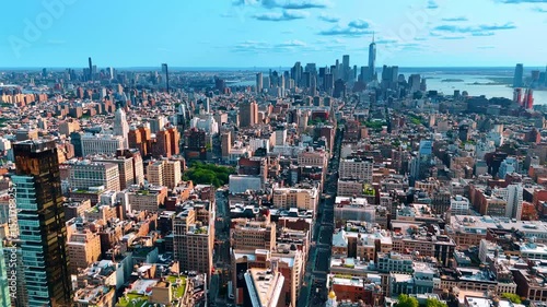Enormous cityscape of New York, USA. Drone descends above the Fifth Avenue leading to the stunning Manhattan.