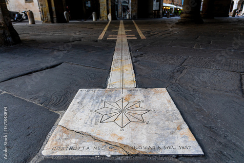 Fototapeta Naklejka Na Ścianę i Meble -  Streets of Bergamo’s Città Alta in Italy with terracotta rooftops, historic churches, and mountain backdrop on a clear day