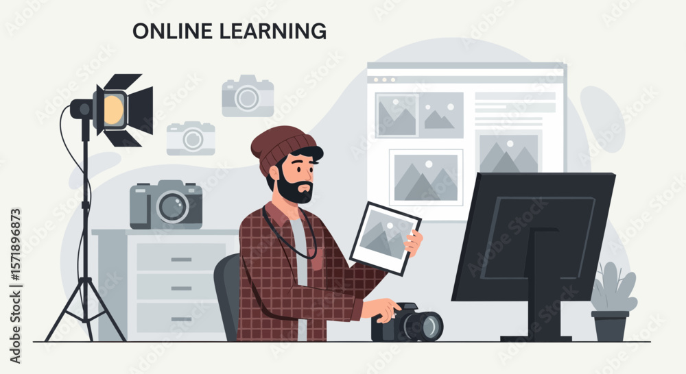 Photographer Learning Online In A Creative Studio Workspace Revising Images