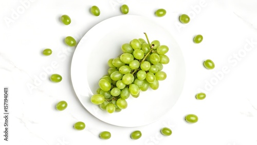 Fresh Green Grapes on a White Plate with Grapes Arranged Around
