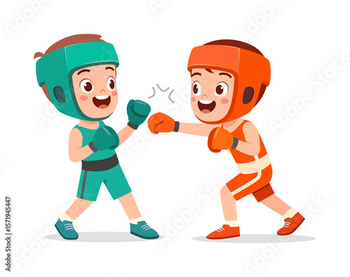 Two young boys are boxing and smiling while playing together in indoor during daytime