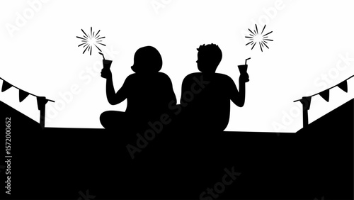 Silhouette of couple sitting with drinks and sparklers under a festive banner celebrating together outdoors