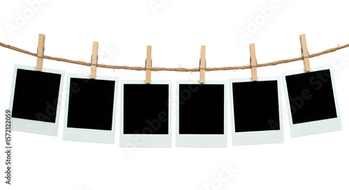 A row of six Polaroid frames hanging on a rope with clothespins, evoking nostalgia and simple moments. Isolated on white or transparent background. PNG format.