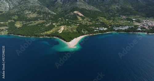Wallpaper Mural Dense Forest Over Zlatni Rat Beach With Mountain Range Backdrop In Spit, Croatia. Aerial Drone Shot Torontodigital.ca
