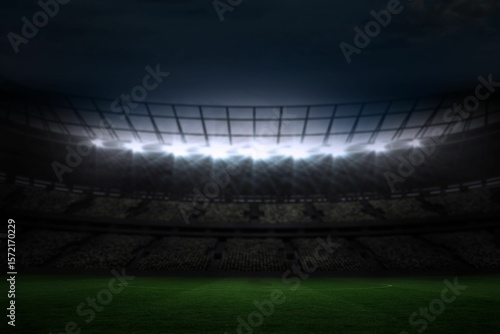 Large football stadium under night sky