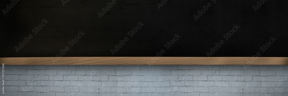 Naklejka premium Flat design is showing large black chalkboard mounted on painted gray brick wall with wooden ledge