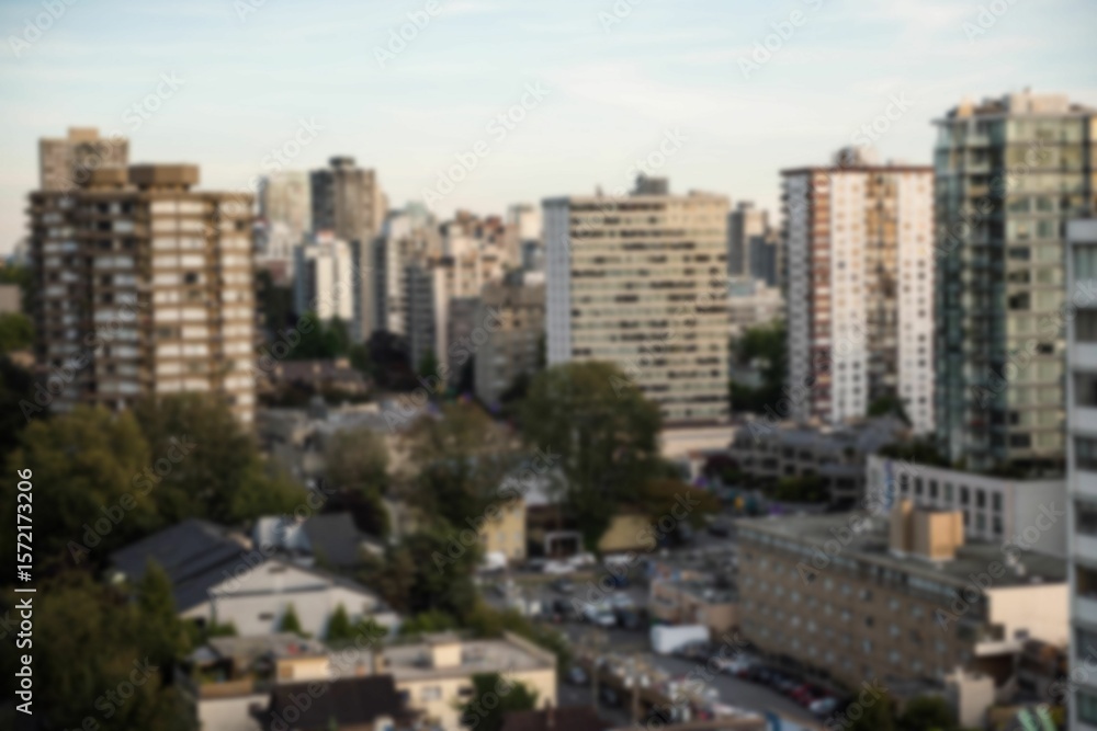 Fototapeta premium Blurry view of cityscape during summer