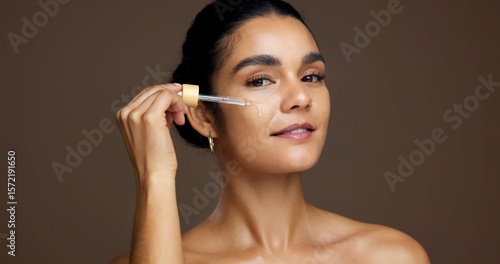 Canvas Print Beauty, portrait and serum with woman in studio for antiaging cosmetics or dermatology treatment
