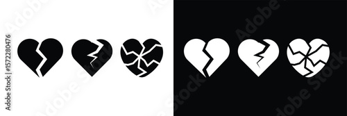 Broken heart silhouette icon set. Cracked love heart vector collection. Black and white heartbreak symbols for sadness, pain, and breakup themes.