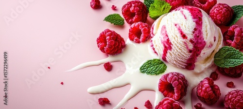 Luscious vanilla ice cream scoop swirling with raspberry ripple on soft pink